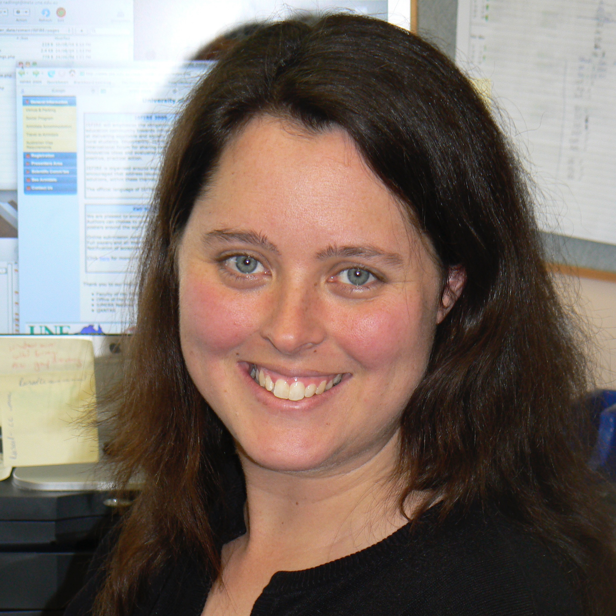 A/Prof Rachael Adlington in an office environment. 